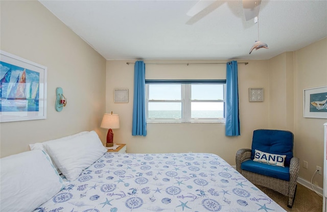 carpeted bedroom with a ceiling fan
