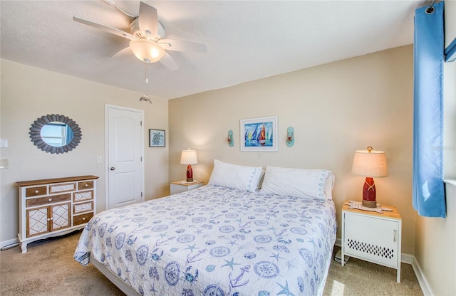 bedroom featuring ceiling fan, carpet floors, and baseboards
