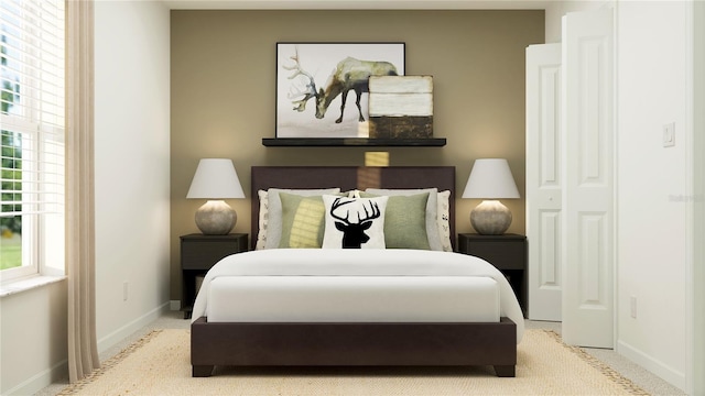 bedroom featuring carpet floors and baseboards