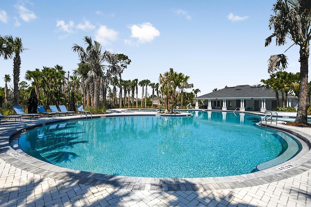 community pool featuring a patio