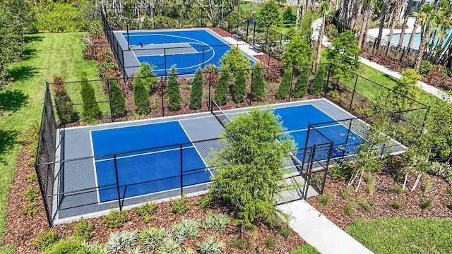 view of basketball court with fence, community basketball court, and a tennis court
