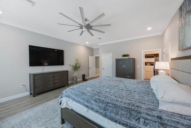 bedroom with baseboards, ornamental molding, recessed lighting, and wood finished floors