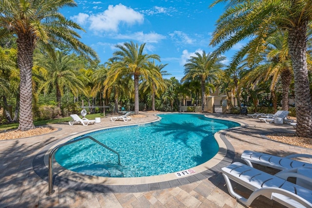 pool featuring a patio area
