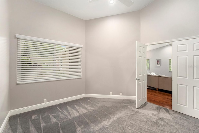 3268 Tanglewood Trl, Palm Harbor, FL 34685 - unfurnished bedroom featuring carpet flooring and baseboards