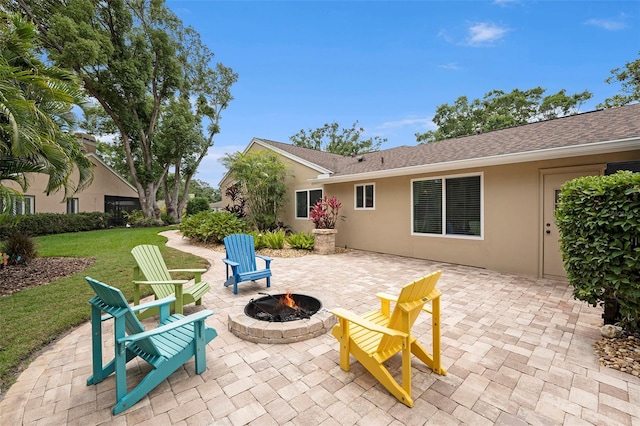 3268 Tanglewood Trl, Palm Harbor, FL 34685 - view of patio / terrace with an outdoor fire pit