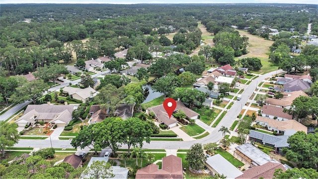 3268 Tanglewood Trl, Palm Harbor, FL 34685 - aerial overview of property's location featuring nearby suburban area and a forest