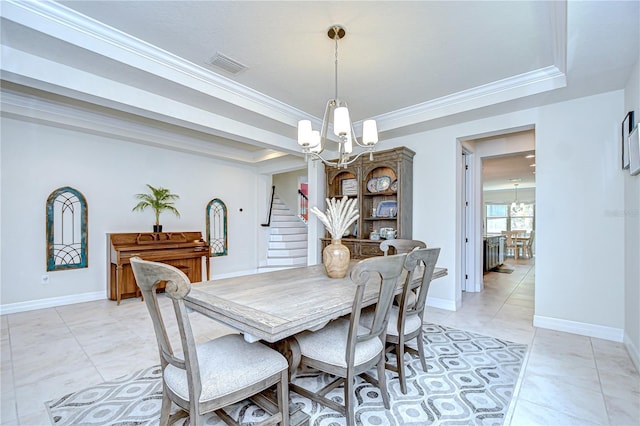 dining space featuring a chandelier, stairs, a raised ceiling, and crown molding