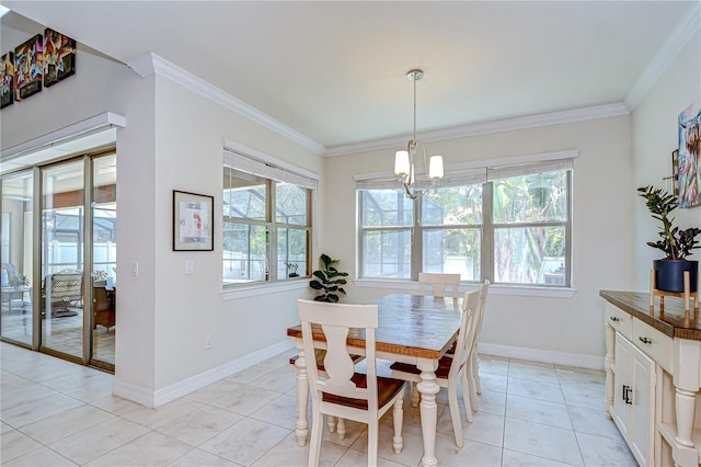 dining area with plenty of natural light, a chandelier, crown molding, baseboards, and light tile patterned flooring