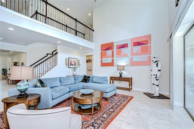 living room featuring a high ceiling, stairs, crown molding, recessed lighting, and tile patterned floors