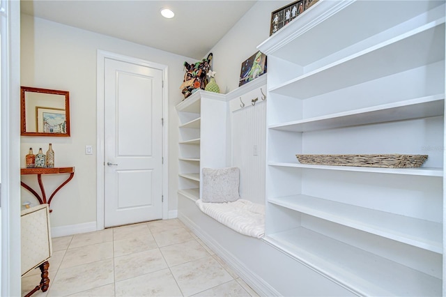mudroom featuring light tile patterned flooring, baseboards, and recessed lighting