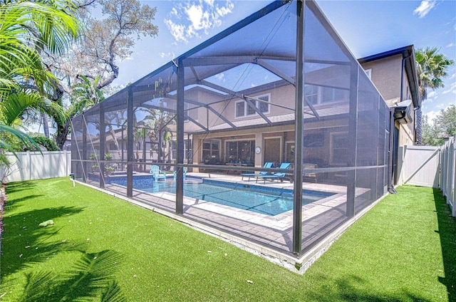 view of pool with a patio area and a lanai