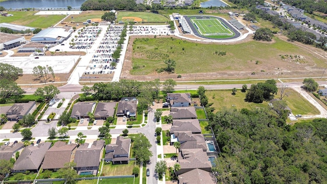 aerial view of property's location featuring nearby suburban area