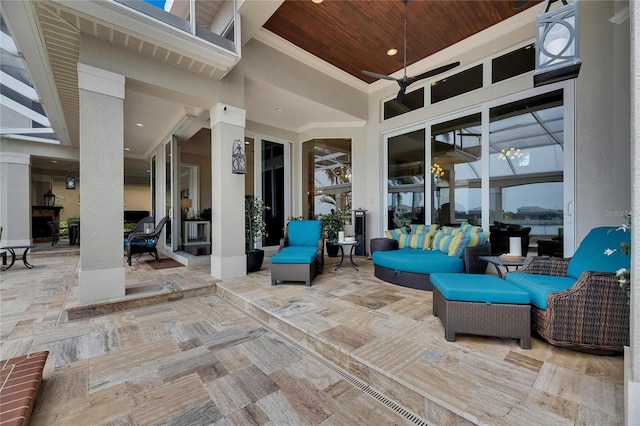view of patio featuring an outdoor hangout area and ceiling fan