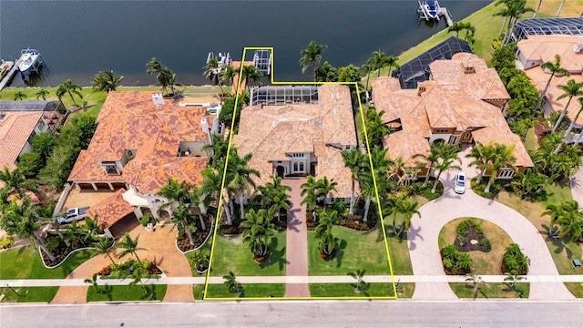 aerial overview of property's location featuring a nearby body of water and property parcel outlined