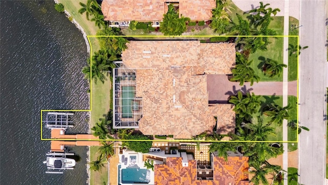view of property location with property parcel outlined and a nearby body of water