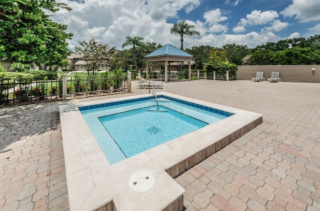 3079 Landmark Blvd Unit 1608, Palm Harbor, FL 34684 - view of swimming pool featuring a swimming pool, a gazebo, and a patio
