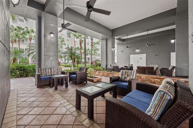 view of patio / terrace featuring a ceiling fan and outdoor lounge area