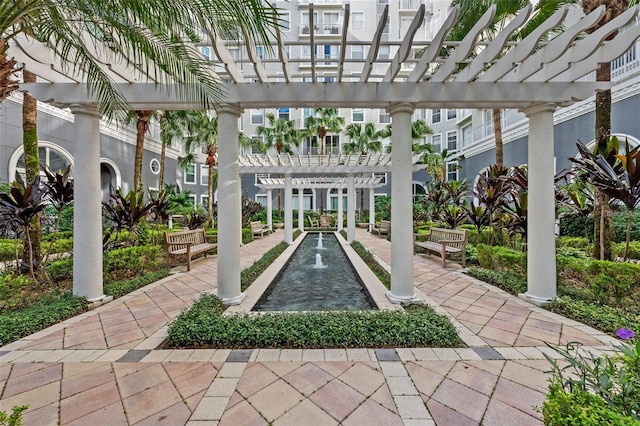 view of home's community with a pergola