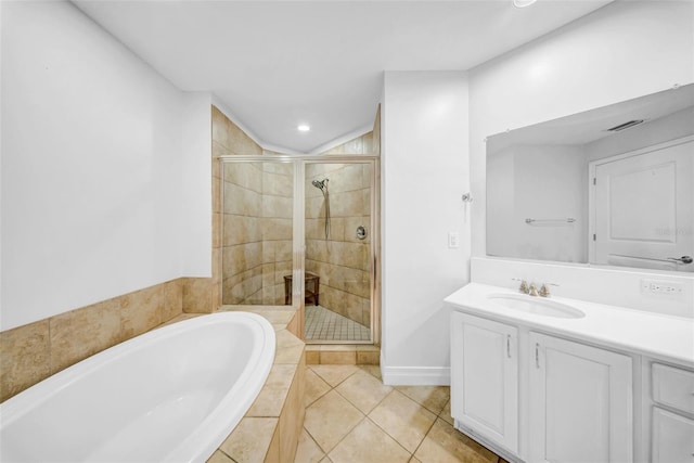 bathroom featuring a stall shower, vanity, recessed lighting, and a bath