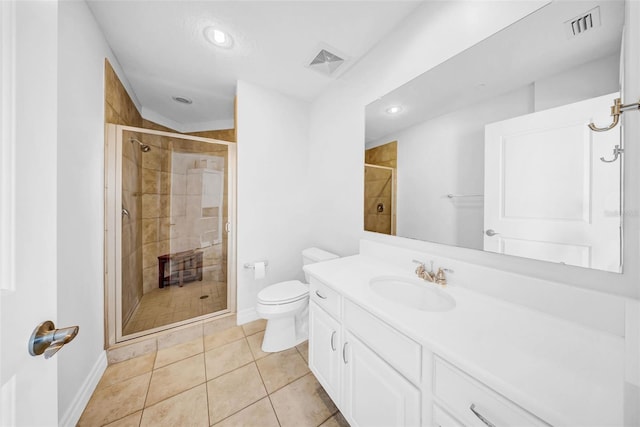 bathroom with toilet, visible vents, and a shower stall