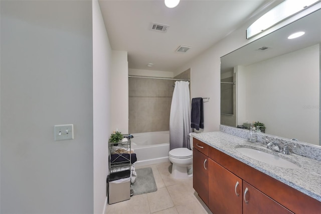 full bathroom featuring tile patterned flooring, toilet, visible vents, and vanity