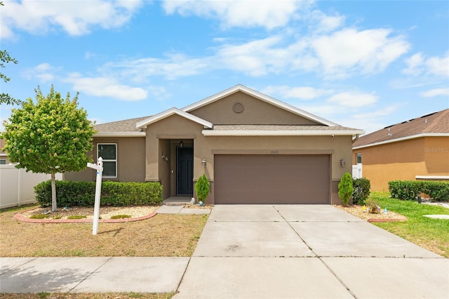 10626 Laguna Plains Dr, Riverview, FL 33578 - single story home with stucco siding, a garage, driveway, and a front lawn