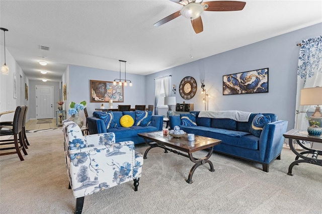 10626 Laguna Plains Dr, Riverview, FL 33578 - living room featuring light carpet and ceiling fan
