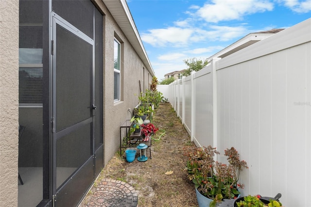 10626 Laguna Plains Dr, Riverview, FL 33578 - view of side of property with a fenced backyard and stucco siding