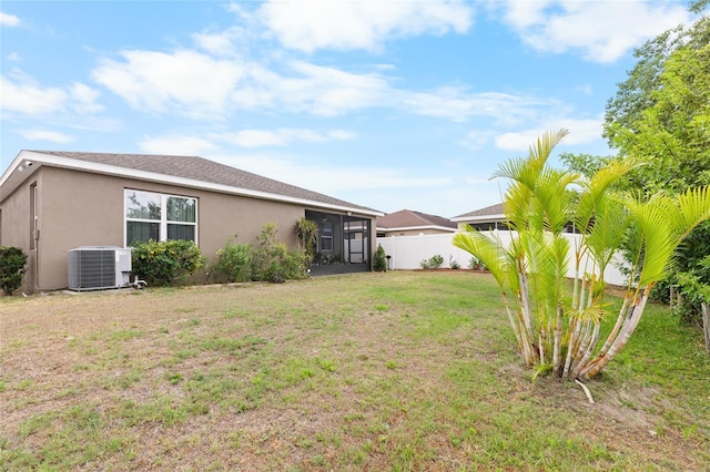 10626 Laguna Plains Dr, Riverview, FL 33578 - view of yard with central AC and a sunroom