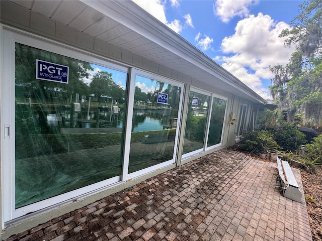 11473 W Sandpiper Ct, Crystal River, FL 34429 - view of patio featuring a water view