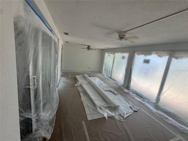 11473 W Sandpiper Ct, Crystal River, FL 34429 - unfurnished room with ceiling fan and a textured ceiling