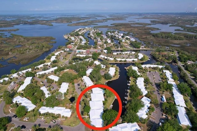 11473 W Sandpiper Ct, Crystal River, FL 34429 - aerial overview of property's location with a large body of water and nearby suburban area