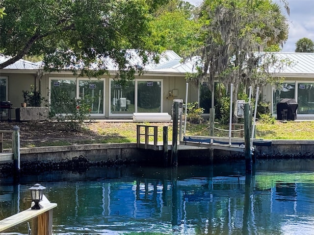11473 W Sandpiper Ct, Crystal River, FL 34429 - back of property featuring metal roof and a standing seam roof