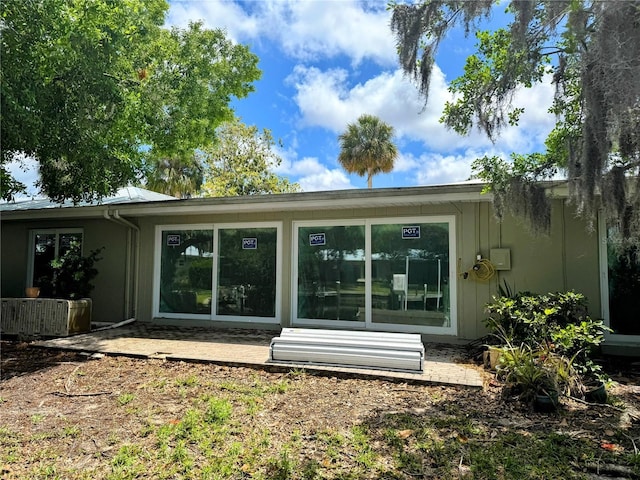 11473 W Sandpiper Ct, Crystal River, FL 34429 - rear view of property featuring central AC