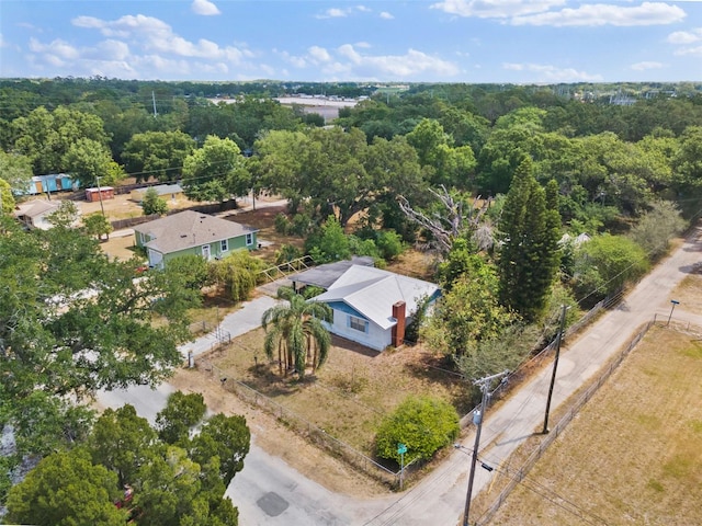 aerial view with a wooded view