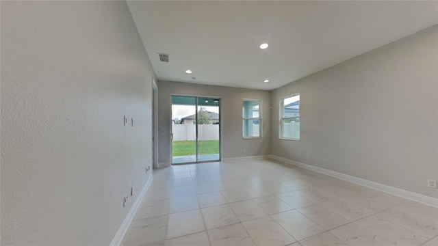 20092 Stone Pine Cir, Lutz, FL 33558 - spare room with recessed lighting, baseboards, and light marble finish floors