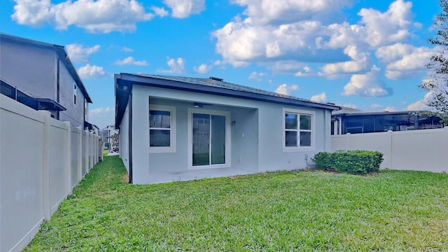 20092 Stone Pine Cir, Lutz, FL 33558 - rear view of property featuring stucco siding and ceiling fan