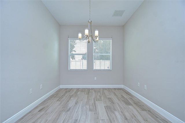 5732 Stockport St, Riverview, FL 33578 - unfurnished room featuring baseboards, a notable chandelier, light wood-style flooring, and visible vents