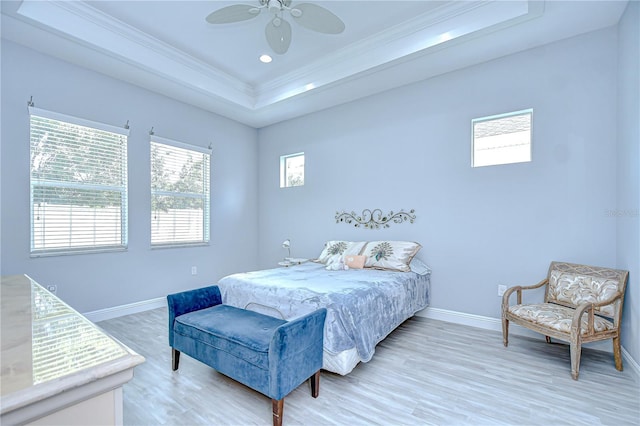 5732 Stockport St, Riverview, FL 33578 - bedroom featuring baseboards, multiple windows, a tray ceiling, and crown molding