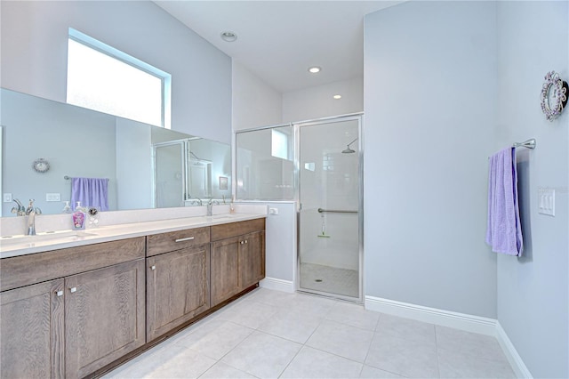 5732 Stockport St, Riverview, FL 33578 - full bathroom with double vanity, a sink, baseboards, tile patterned flooring, and a shower stall