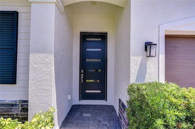 5732 Stockport St, Riverview, FL 33578 - property entrance with stucco siding