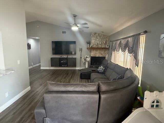 1710 Tallowtree Cir, Valrico, FL 33594 - living area with wood finished floors, a fireplace, baseboards, ceiling fan, and lofted ceiling