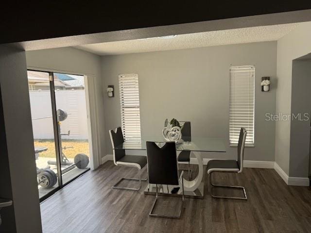 1710 Tallowtree Cir, Valrico, FL 33594 - dining room featuring baseboards and wood finished floors