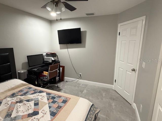 1710 Tallowtree Cir, Valrico, FL 33594 - bedroom featuring visible vents, baseboards, and a ceiling fan