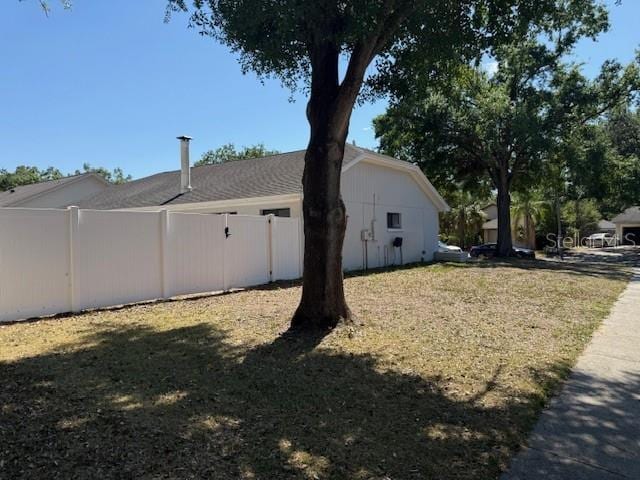 1710 Tallowtree Cir, Valrico, FL 33594 - view of side of property featuring fence