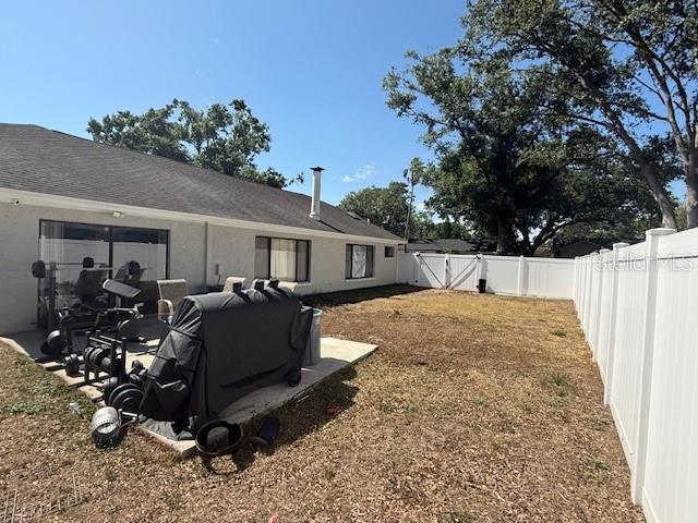 1710 Tallowtree Cir, Valrico, FL 33594 - view of yard with a fenced backyard