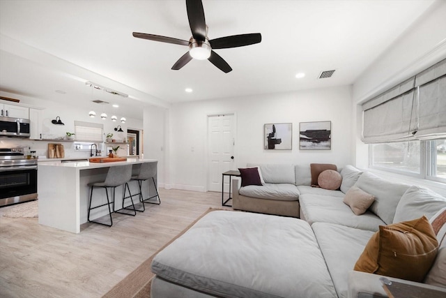 14 S Meteor Ave, Clearwater, FL 33765 - living area featuring ceiling fan, light wood-style floors, and recessed lighting