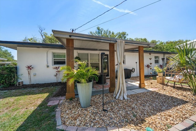 14 S Meteor Ave, Clearwater, FL 33765 - view of front facade with stucco siding