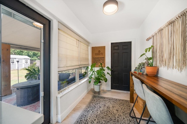 14 S Meteor Ave, Clearwater, FL 33765 - entrance foyer with light wood finished floors and baseboards