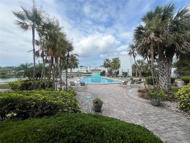 community pool with a patio